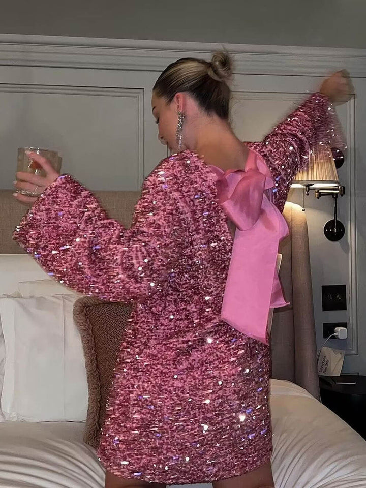 Janice | robe à paillettes avec nœud et fermeture à nœud