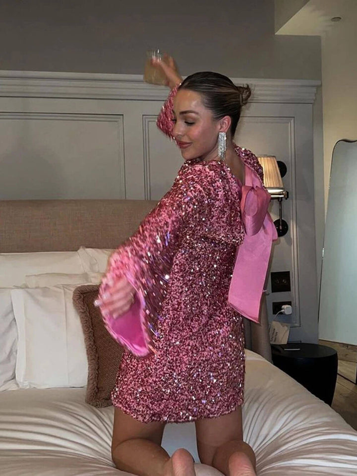 Janice | robe à paillettes avec nœud et fermeture à nœud