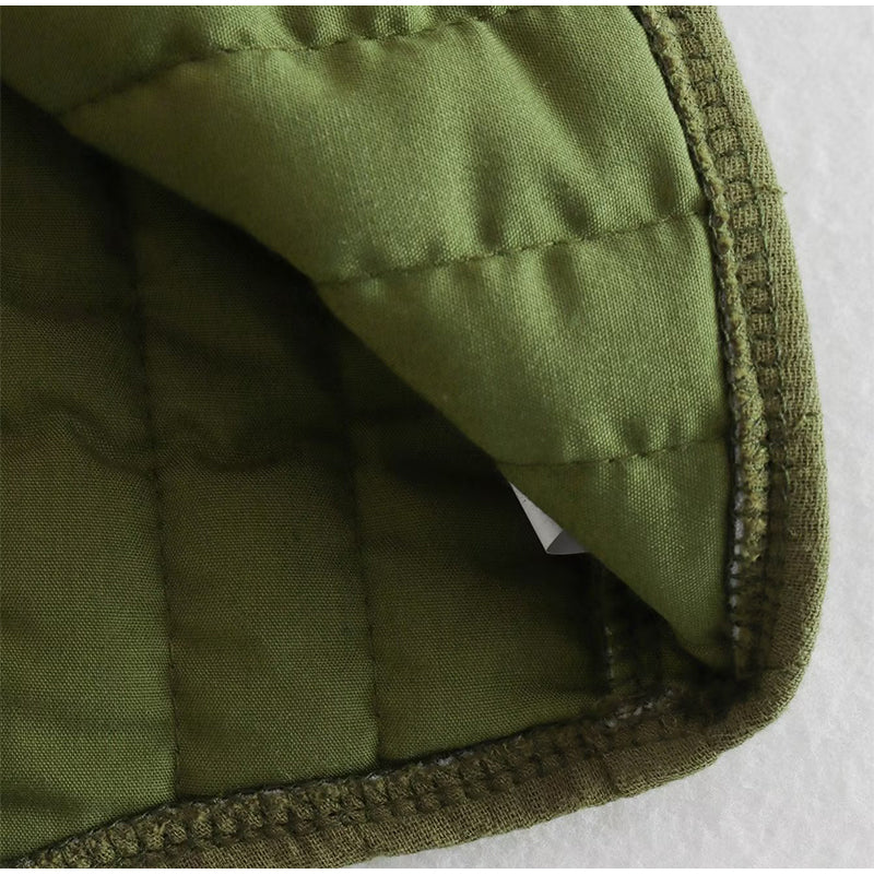 Nia | Gilet vert avec impression de fleurs