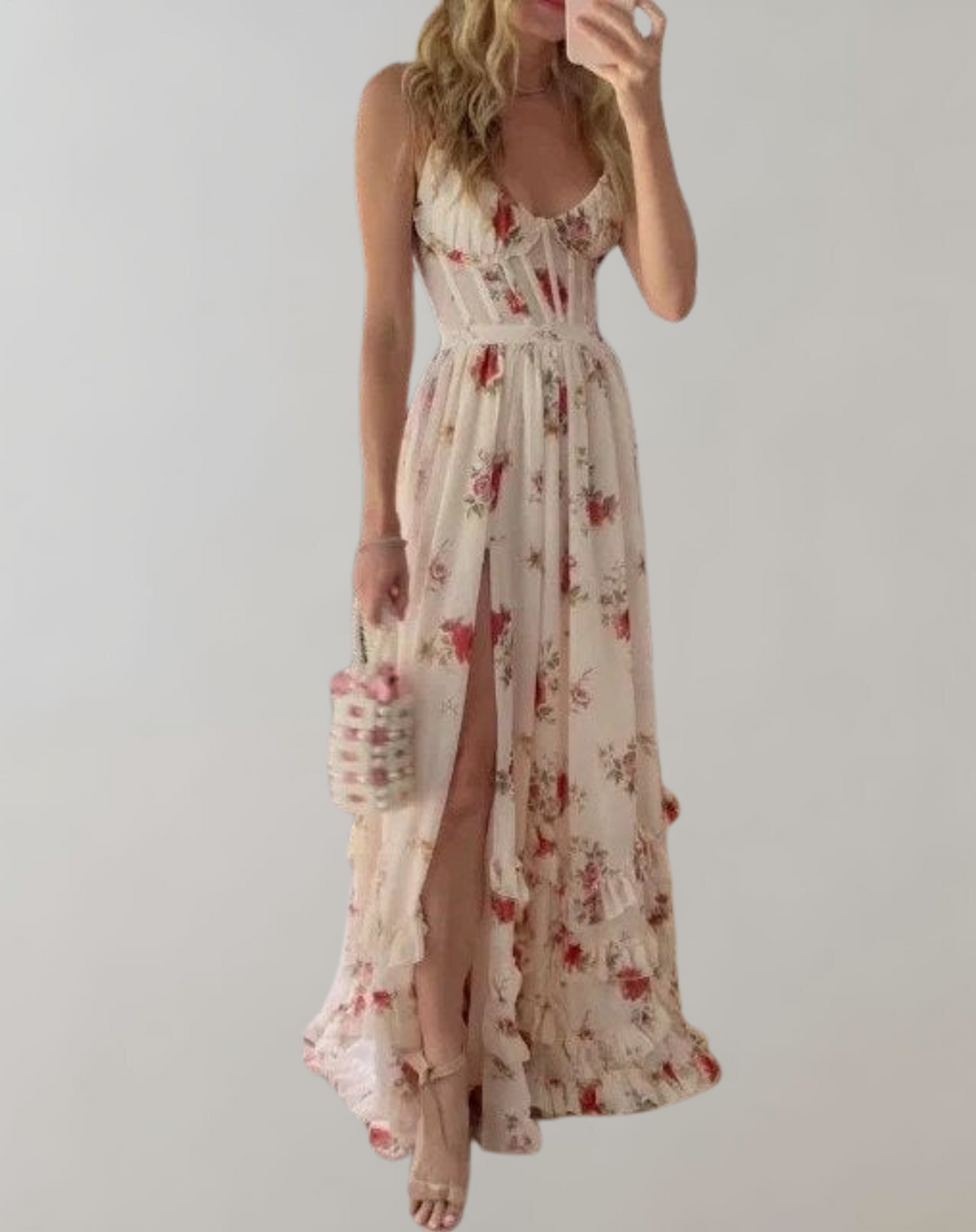 Patronela | Robe cintrée sans manches avec imprimé floral et échancrure sexy sur la jambe