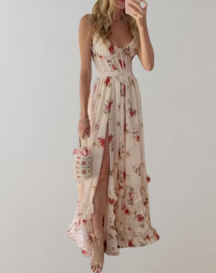 Patronela | Robe cintrée sans manches avec imprimé floral et échancrure sexy sur la jambe