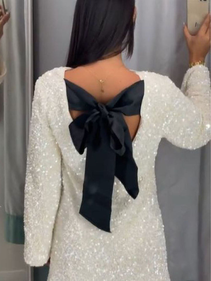 Janice | robe à paillettes avec nœud et fermeture à nœud