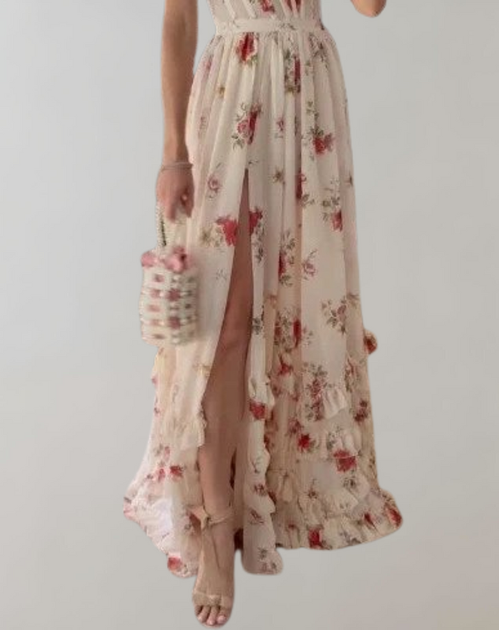 Patronela | Robe cintrée sans manches avec imprimé floral et échancrure sexy sur la jambe
