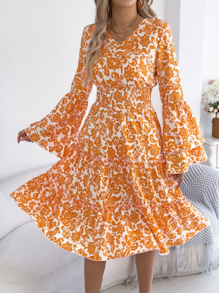Oliviana - Robe midi élégante fleurie à manches longues évasées avec ourlet volanté