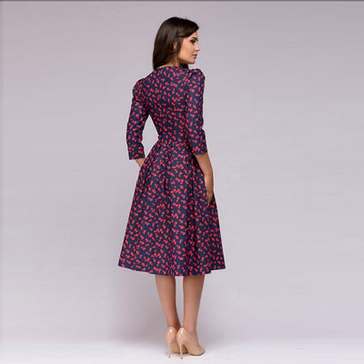 Rotie | Robe rouge à pois avec manches trois-quarts