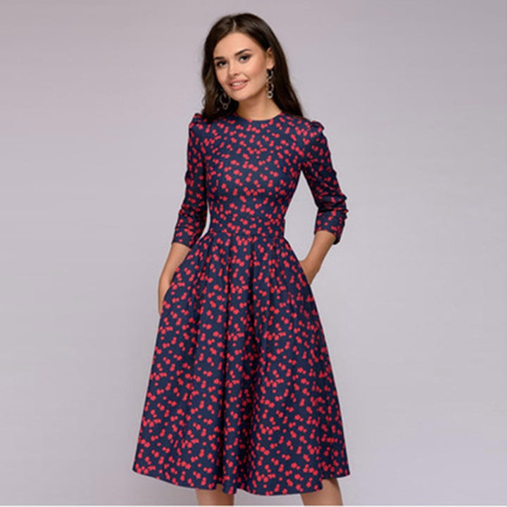 Rotie | Robe rouge à pois avec manches trois-quarts