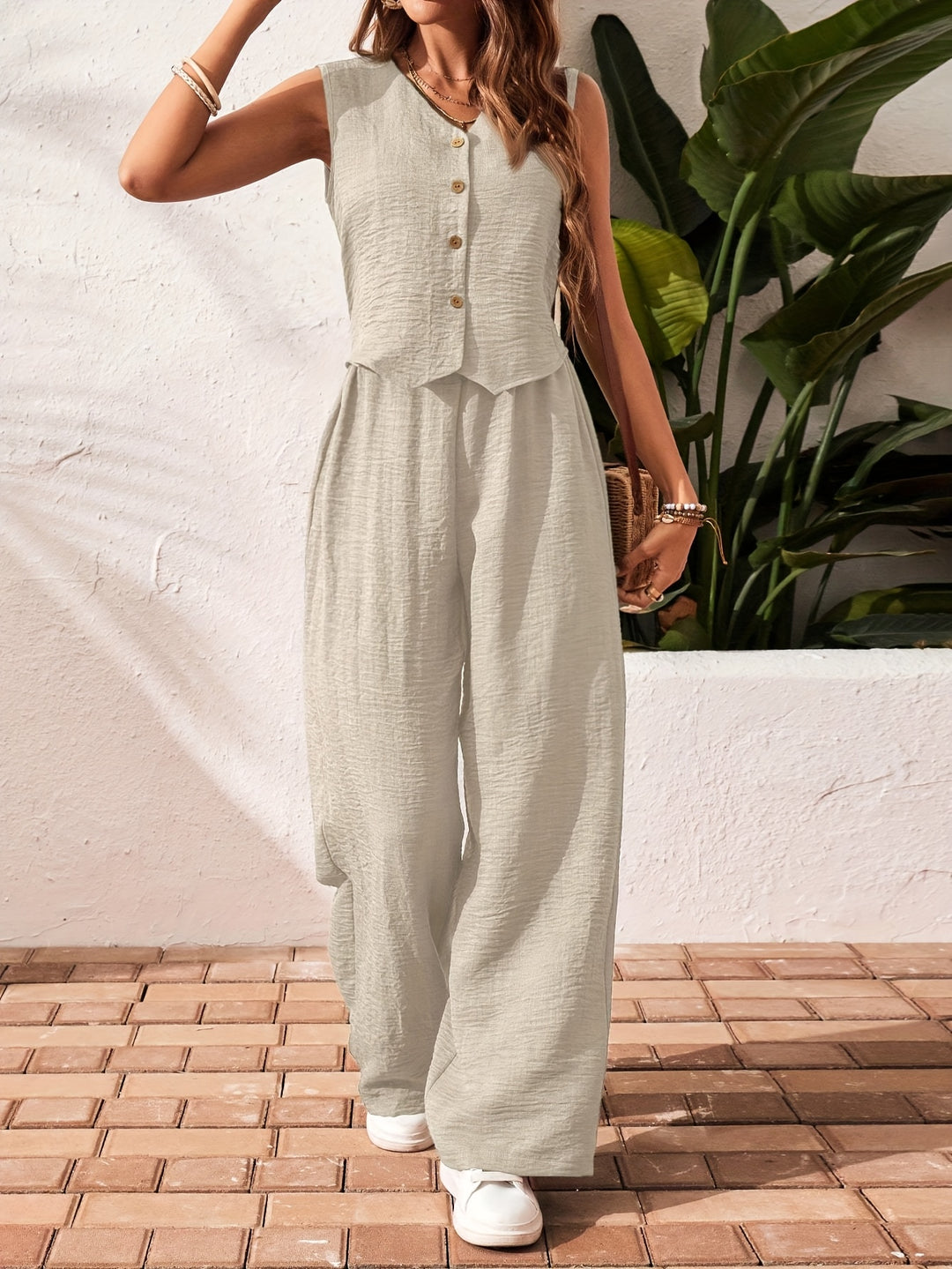 Nashira - Ensemble stylé top sans manches à boutons et pantalon