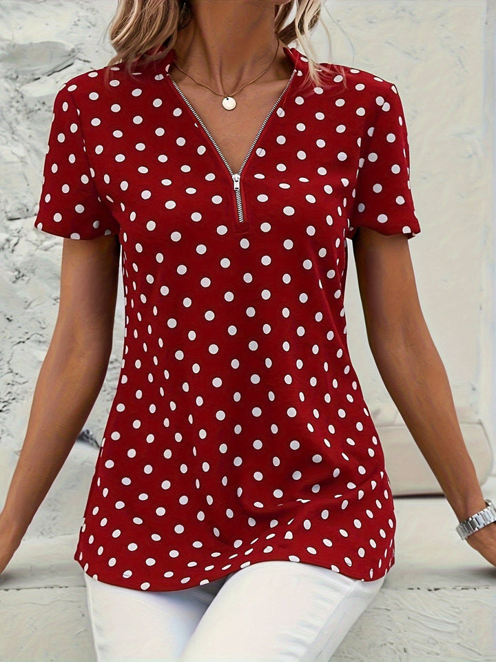 Uzziah - Blouse à pois avec col en V et fermeture zippée quart