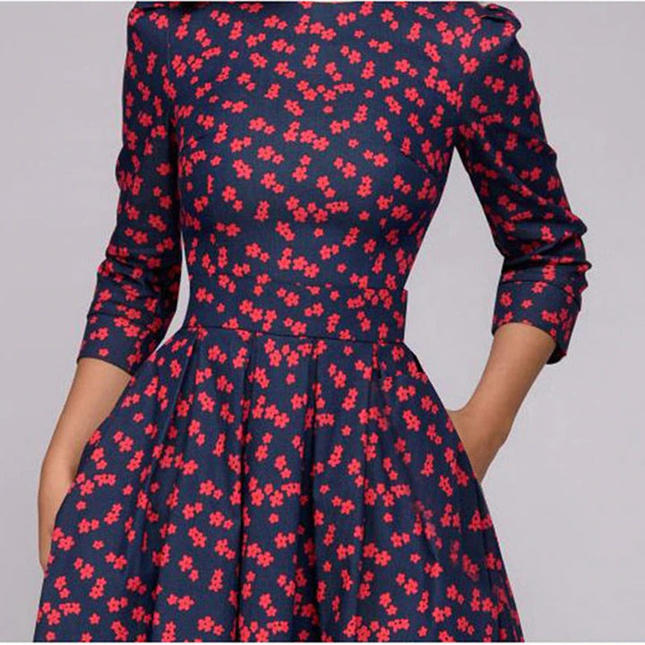Rotie | Robe rouge à pois avec manches trois-quarts