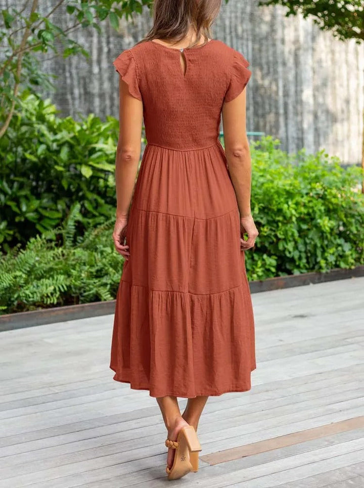 Theudelinda | Robe d'été élégante : détails de volants, poches