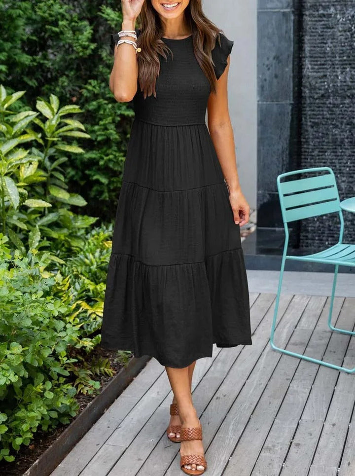Theudelinda | Robe d'été élégante : détails de volants, poches